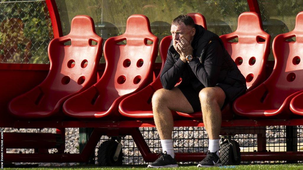 Graham Coughlan in the dug out