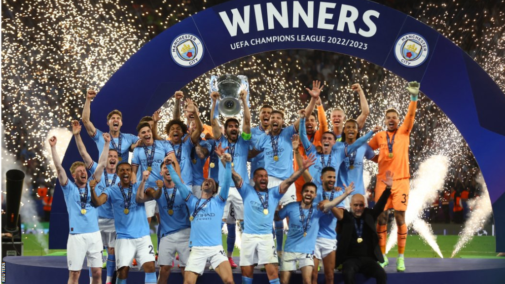 Manchester City lifting the Champions League trophy