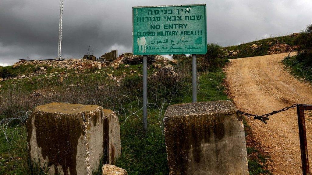 Israeli military warning sign on the Israel-Lebanon border, near the Israeli village of Arab al-Aramshe (15 March 2023)