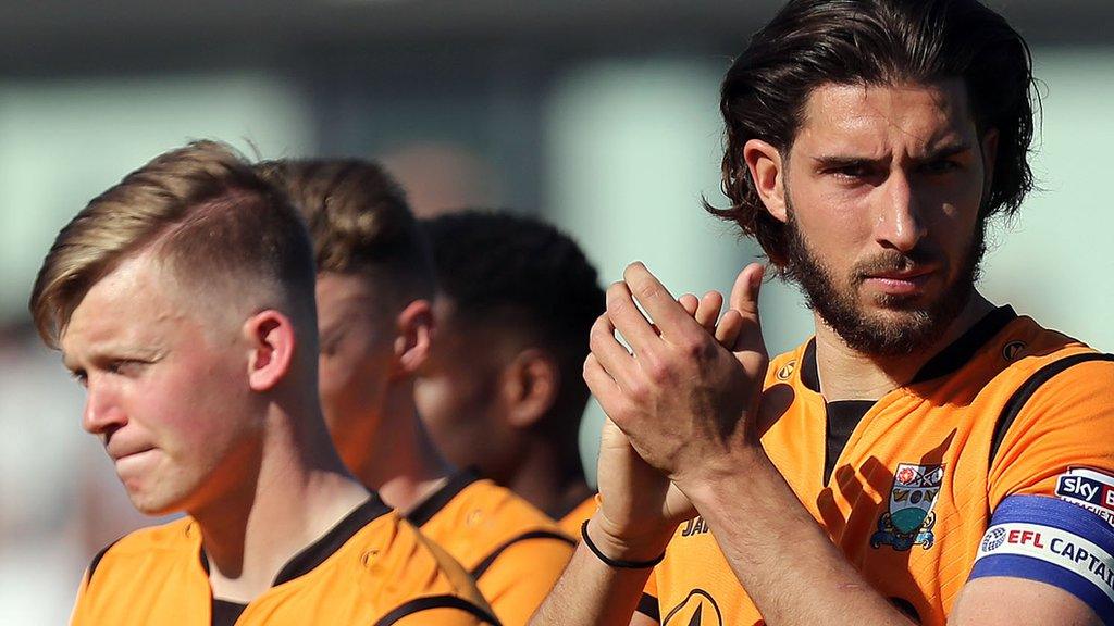 Barnet players applaud their supporters