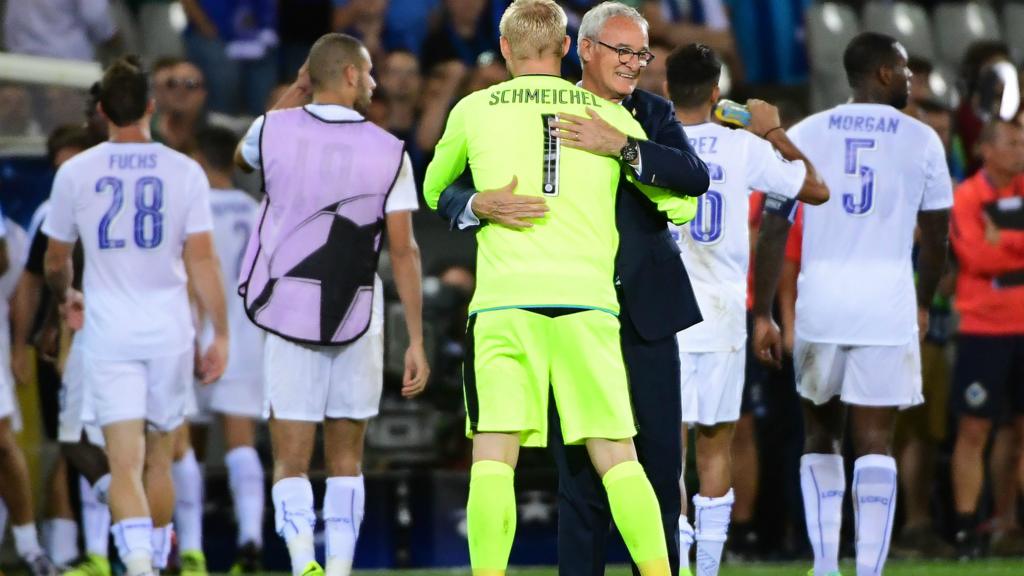 Claudio Ranieri embraces Peter Schmeichel after Leicester victory