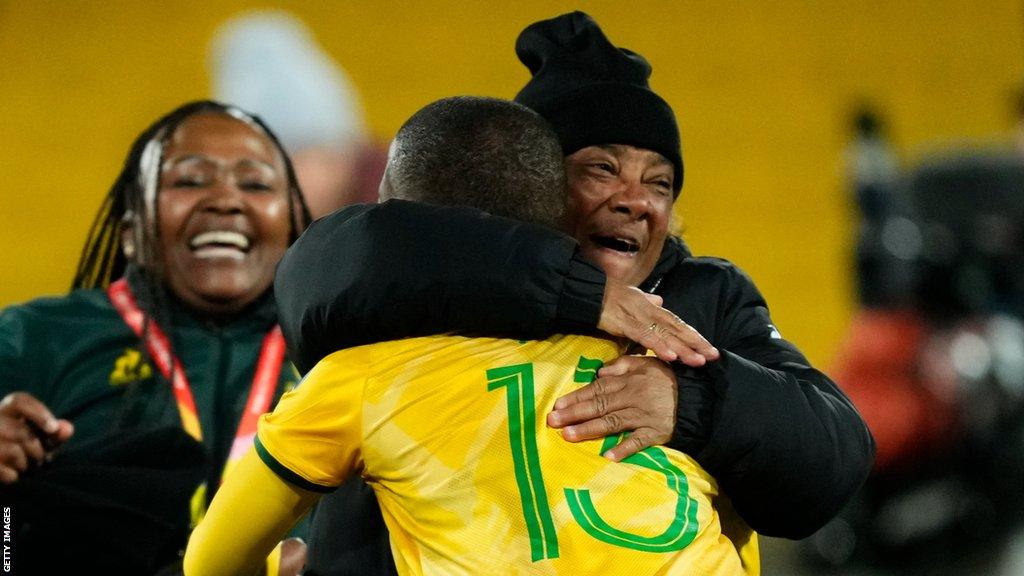 South Africa and coach Desiree Ellis celebrate at the 2023 football Women's World Cup