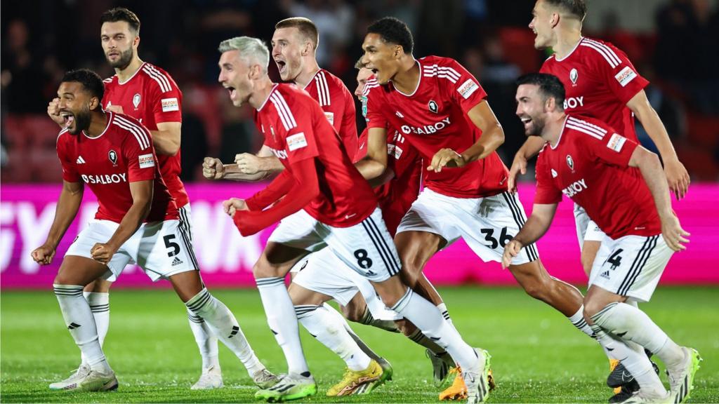 Salford City players celebrate