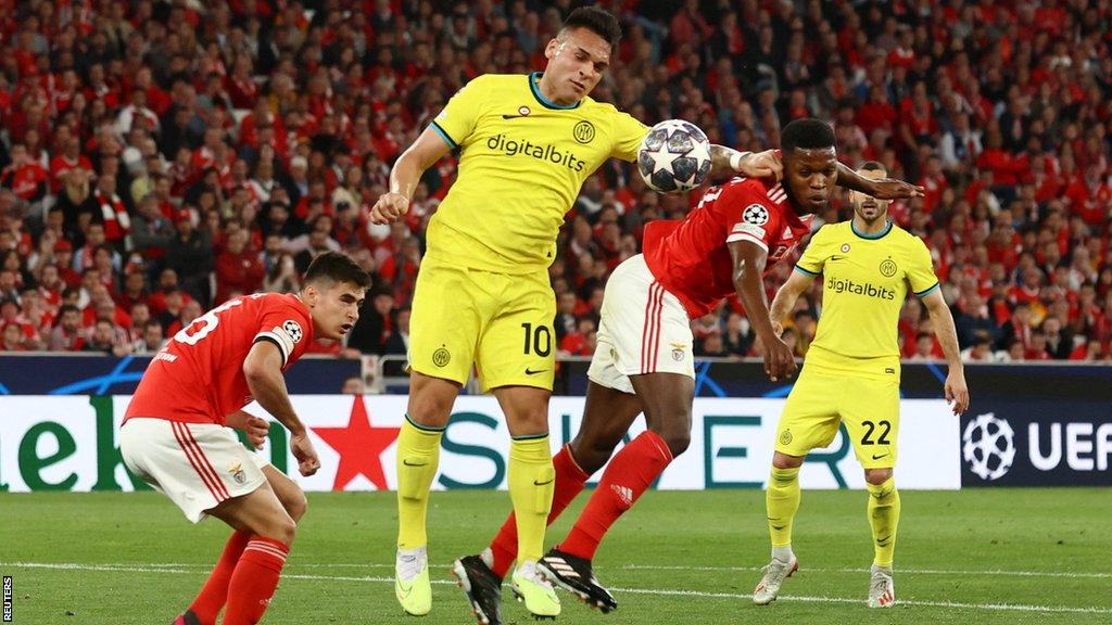 Inter Milan's Lautaro Martinez in action with Benfica's Florentino during the Champions League quarter-final in Lisbon