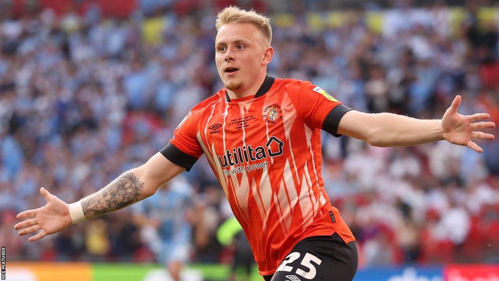 Joe Taylor celebrates a goal for Luton Town