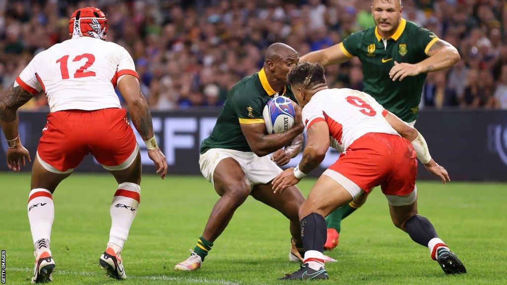 Augustine Pulu of Tonga clashes heads with Makazole Mapimpi of South Africa during the Rugby World Cup match in Marseille