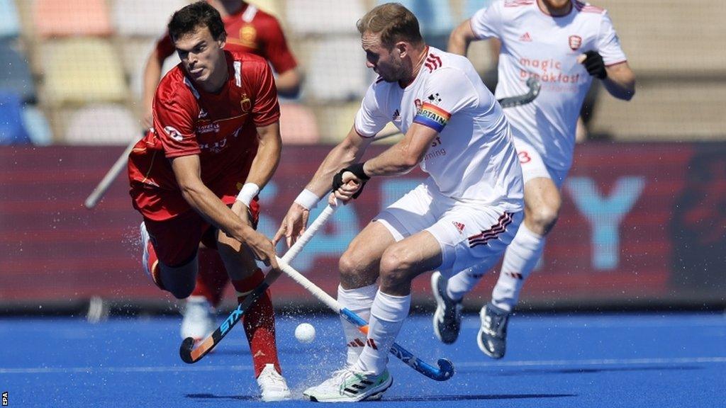 Spain's Xavier Gispert challenges England's David Ames at the 2023 EuroHockey Championships