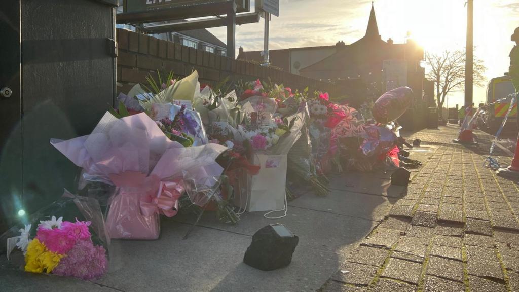 Flowers left outside the pub where Elle Edwards was shot on Christmas Eve