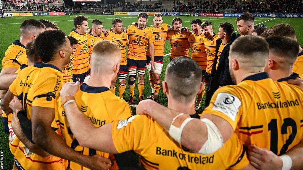 The Ulster players speak in a huddle after the game