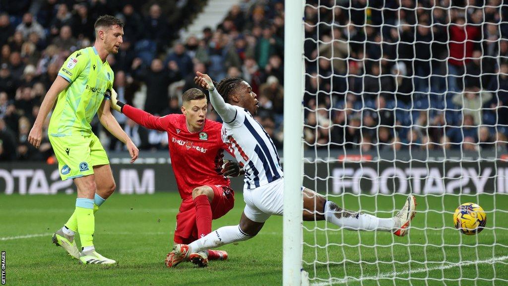 Brandon Thomas-Asante of West Bromwich Albion tries to reach the ball as the third goal goers in off Dominic Hyam during the Sky Bet Championship match between West Bromwich Albion and Blackburn Rovers at The Hawthorns on January 13, 2024 in West Bromwich, England.