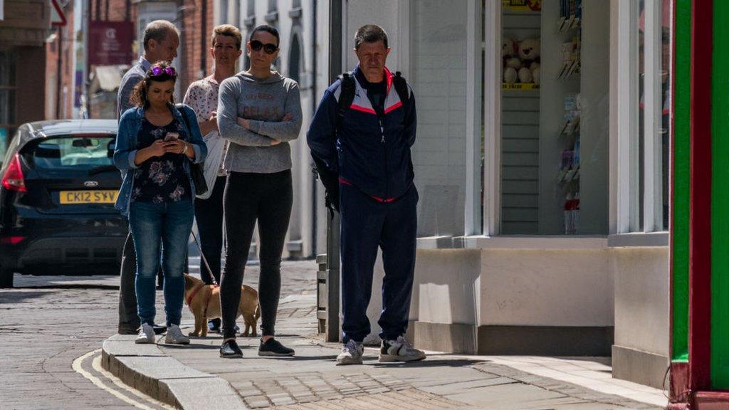 Queueing shoppers