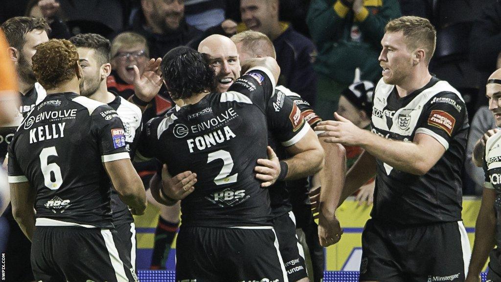 Gareth Ellis is mobbed by jubilant Hull FC team-mates