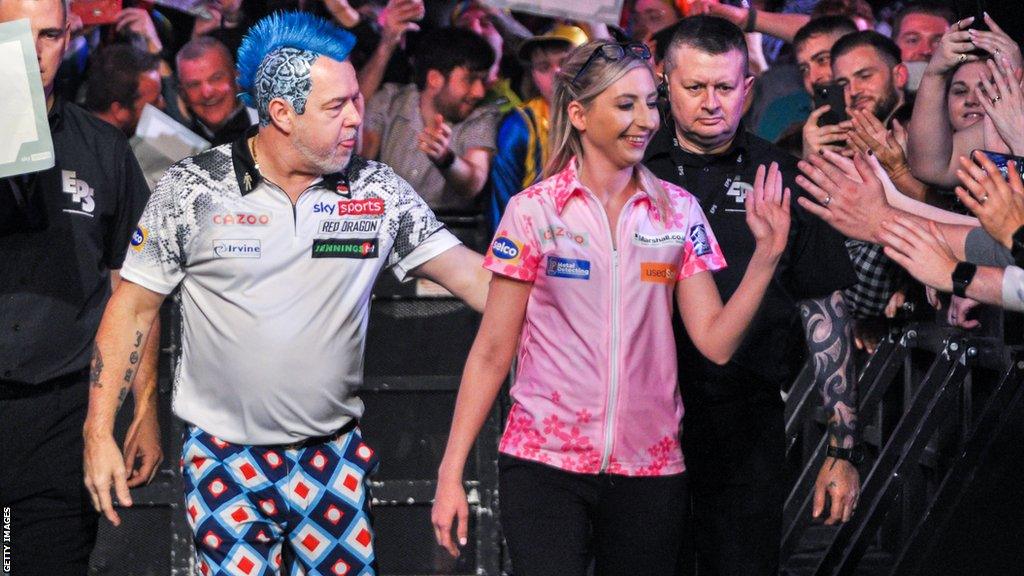 Peter Wright and Fallon Sherrock