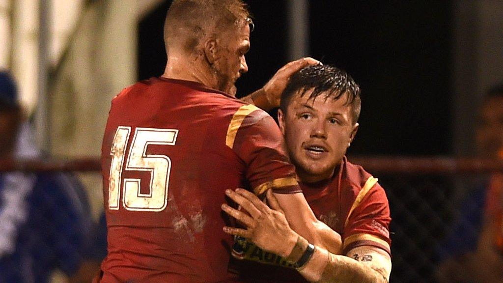 Steff Evans celebrates his second try for Wales