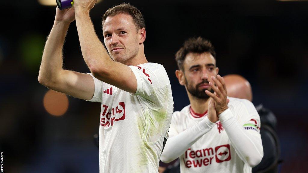 Jonny Evans and Bruno Fernandes at full-time