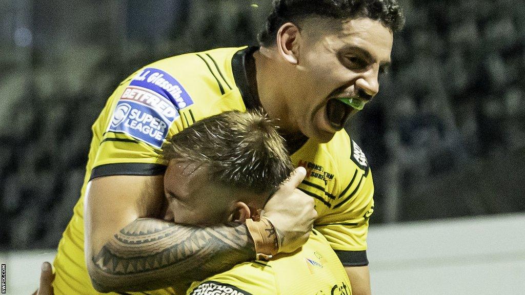 Castleford celebrate one of Greg Eden's three tries