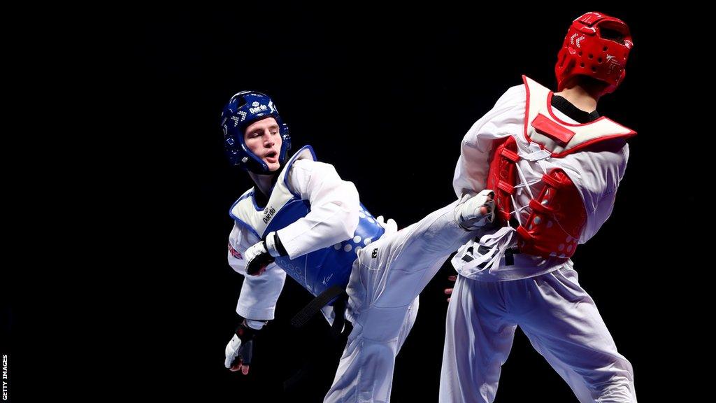 Bradly Sinden of Great Britain and Javier Perez of Spain at the 2019 World Taekwondo Championships