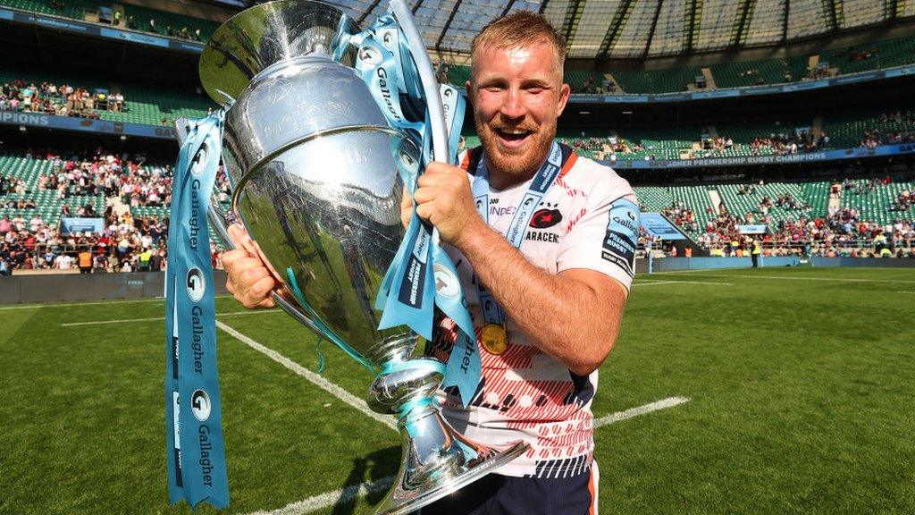 Jackson Wray celebrates with the Premiership trophy