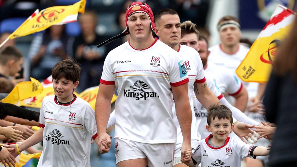 Tom Stewart leads Ulster onto the pitch