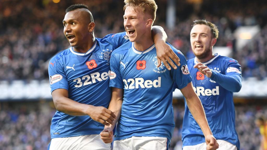 Ross McCrorie celebrates after his header opens the scoring at Ibrox