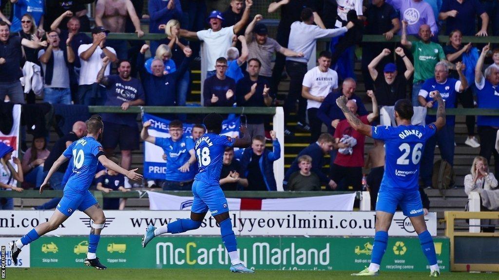 Jesurun Uchegbulam celebrates scoring for Chesterfield at Yeovil in the National League