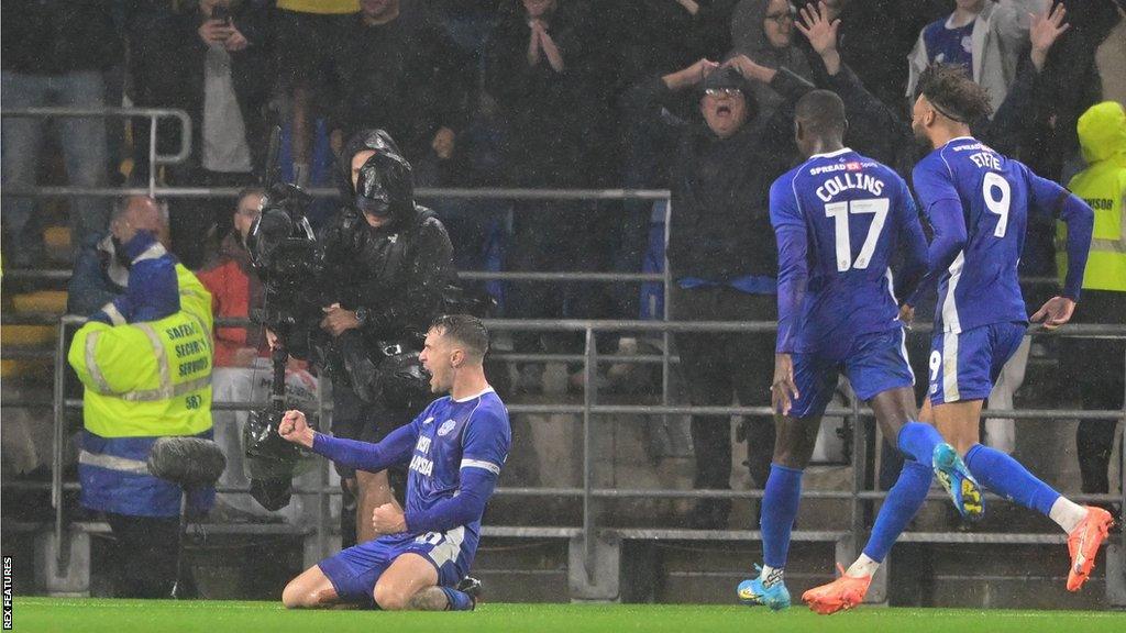 Aaron Ramsey celebrates after his penalty helped secure a 2-0 win for Cardiff against Swansea