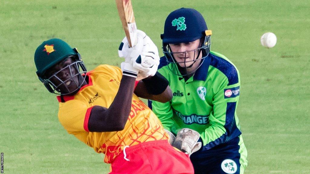 Zimbabwe's Clive Madande and Ireland wicketkeeper Stephen Doheny