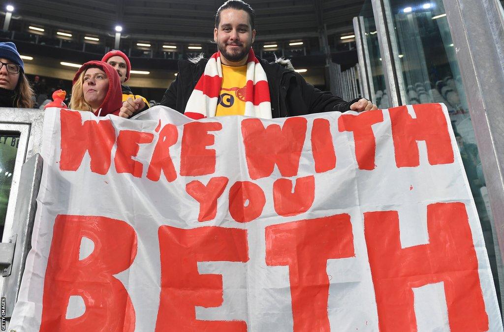 Arsenal supporters hold up a sign for Beth Mead