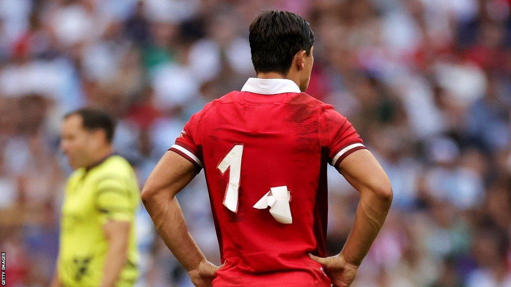 The numbers on the Wales match shirts appear to fall off during the Rugby World Cup quarter-final against Argentina