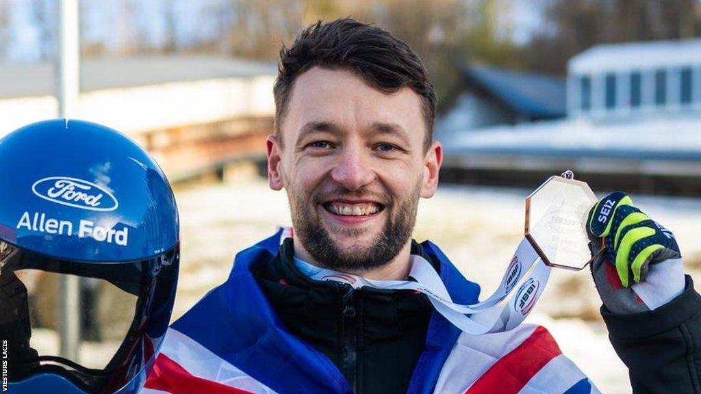 Marcus Wyatt celebrates becoming European champion by holding up his gold medal