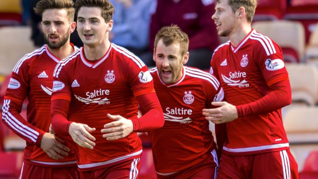 Aberdeen celebrate one of their four goals against Motherwell