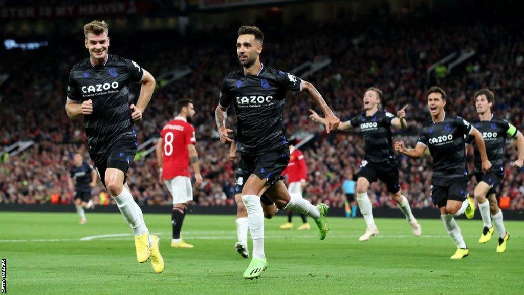 Real Sociedad celebrate at Old Trafford