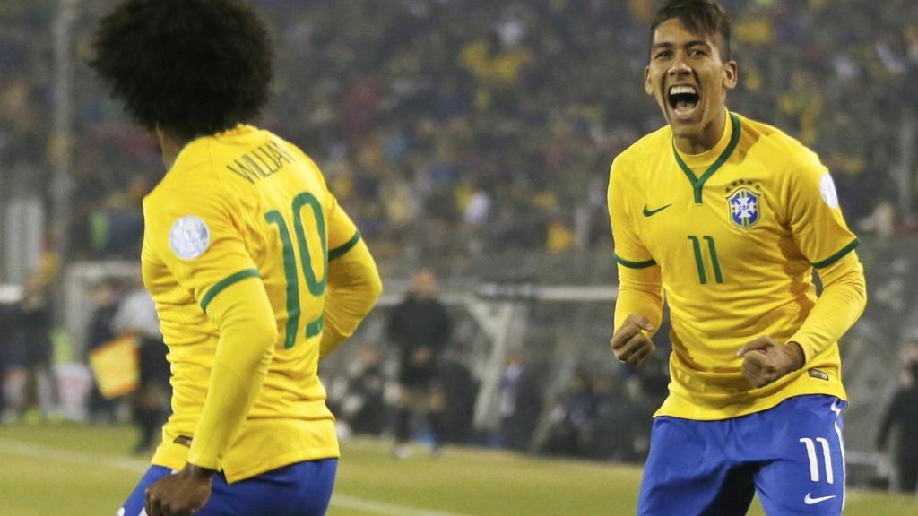 Roberto Firmino celebrates