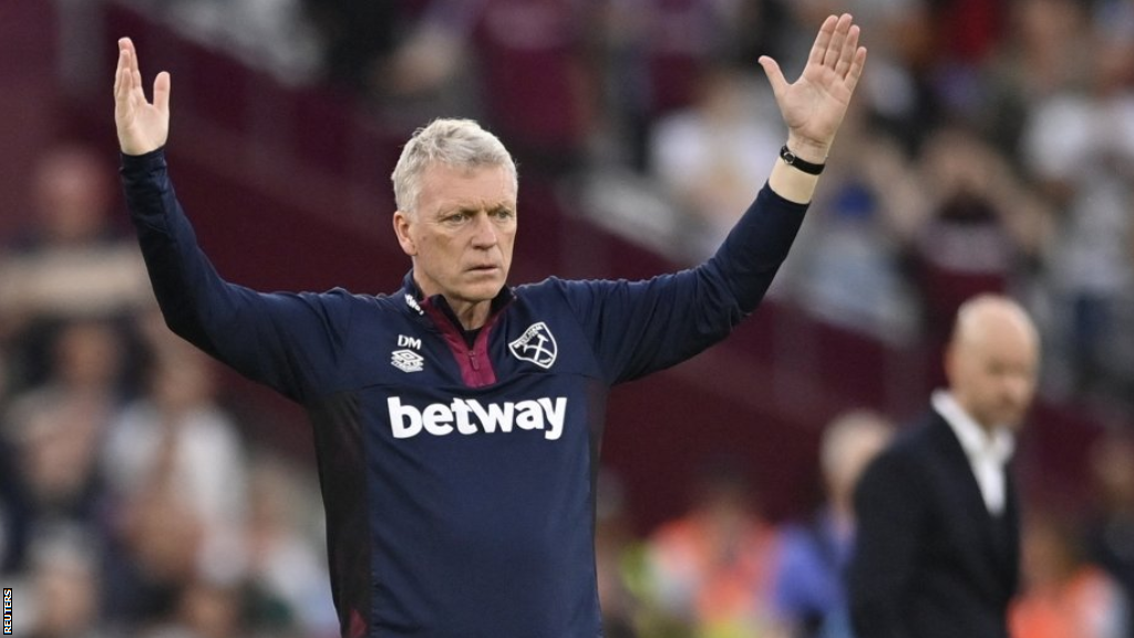 West Ham boss David Moyes raises his arms on the touchline