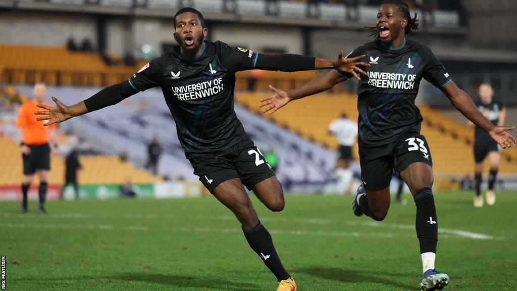 Daniel Kanu, left, celebrates scoring for Charlton Athletic against Port Vale