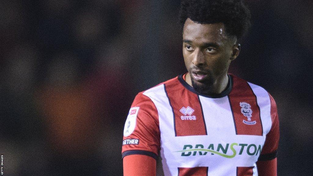 Tashan Oakley-Boothe in action for Lincoln City