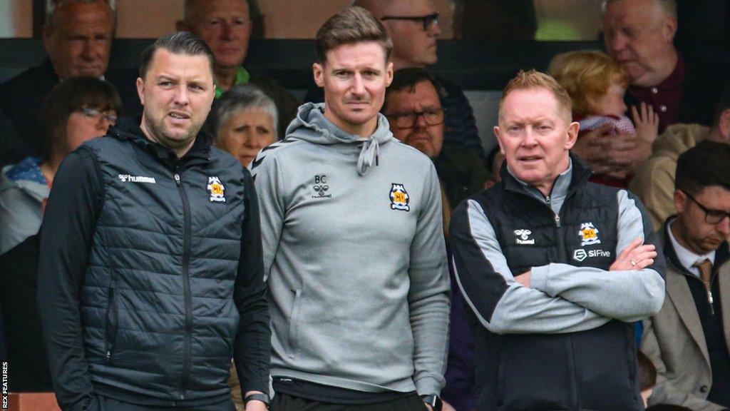 Cambridge United manager Mark Bonner (L) with coach Barry Corr and assistant Gary Waddock (R) before his sacking