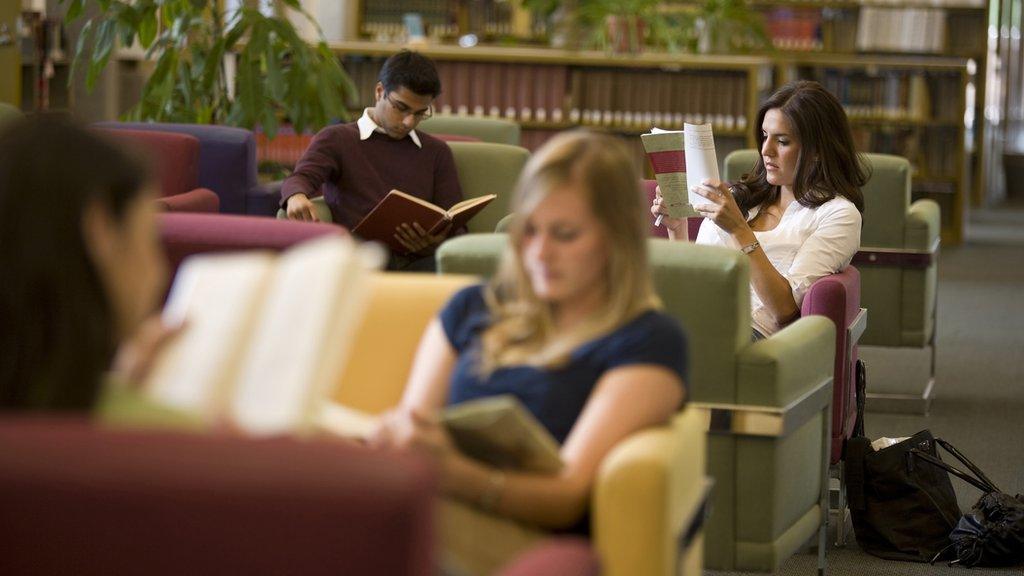 People reading in a library