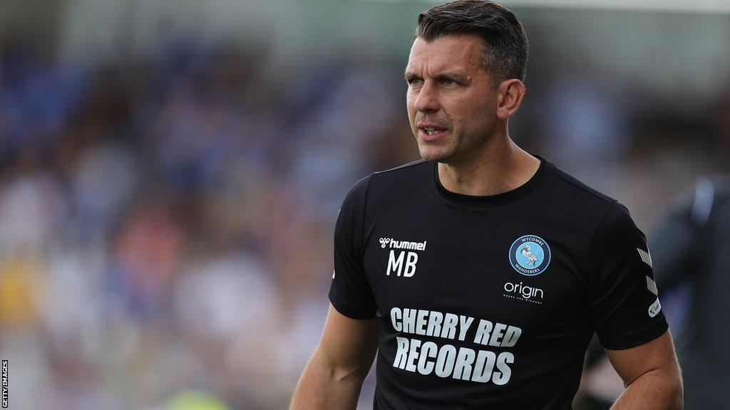 Wycombe head coach Matt Bloomfield watches his team from the touchline