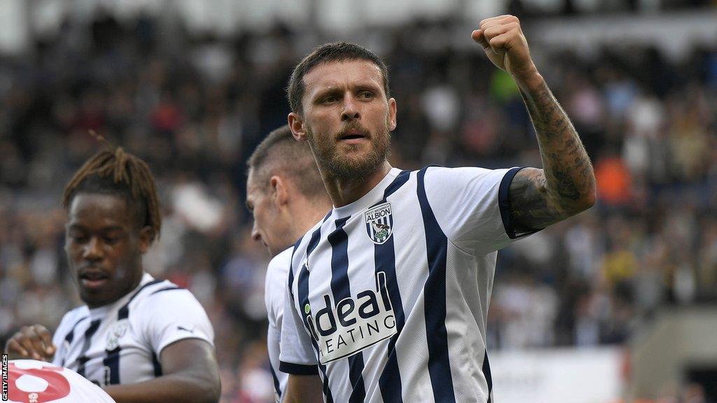 John Swift celebrates a goal for West Brom against Middlesbrough