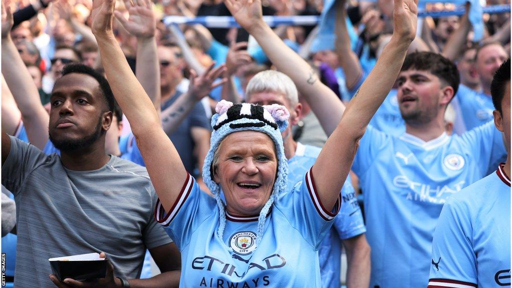 Manchester City fans celebrate