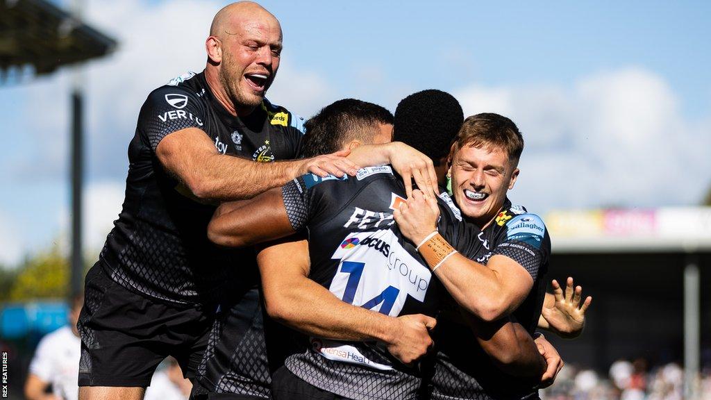 Exeter celebrate a try against Saracens