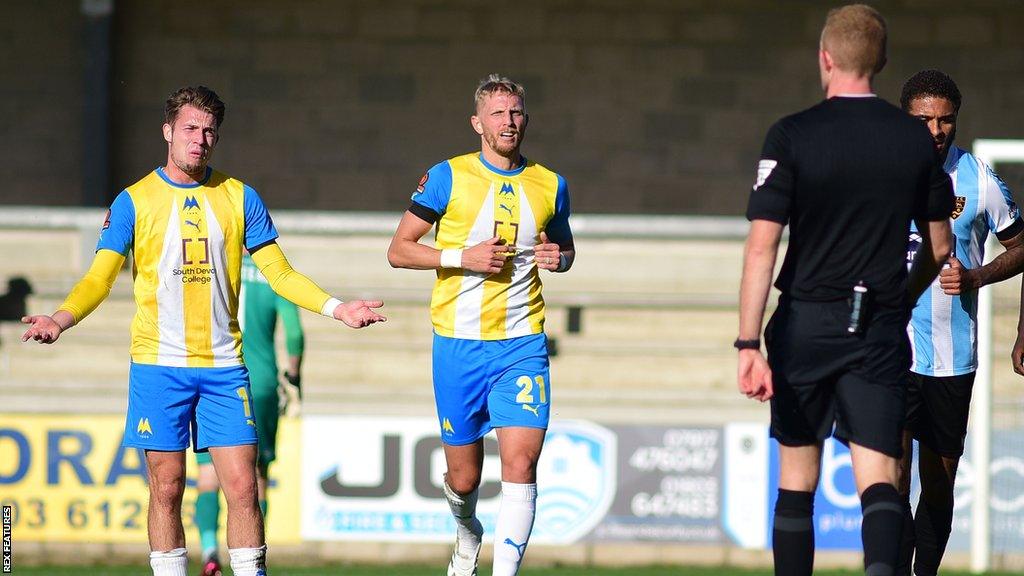 Torquay players appeal to the referee