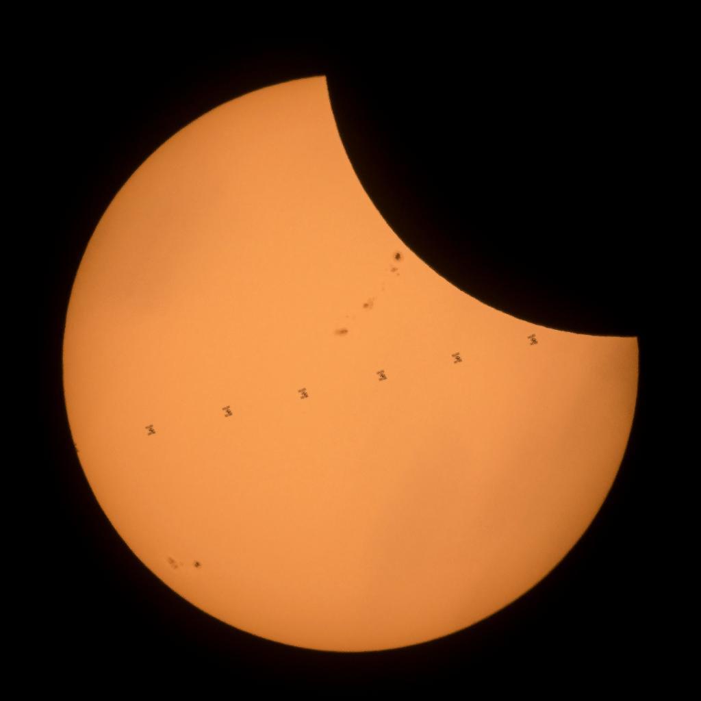 Space station moving across the Sun