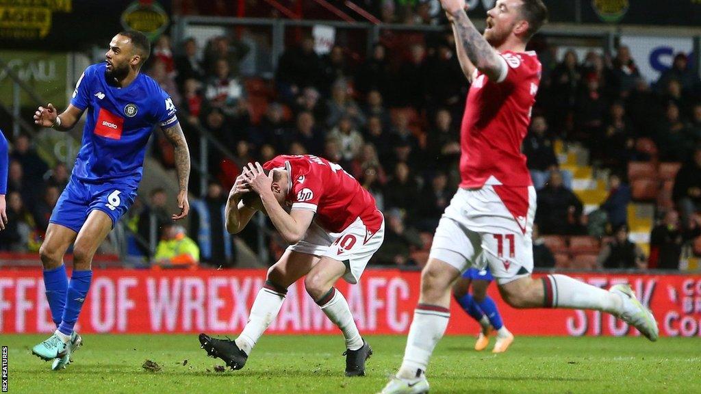 Paul Mullin and Jack Marriott of Wrexham look dejected after a missed chance