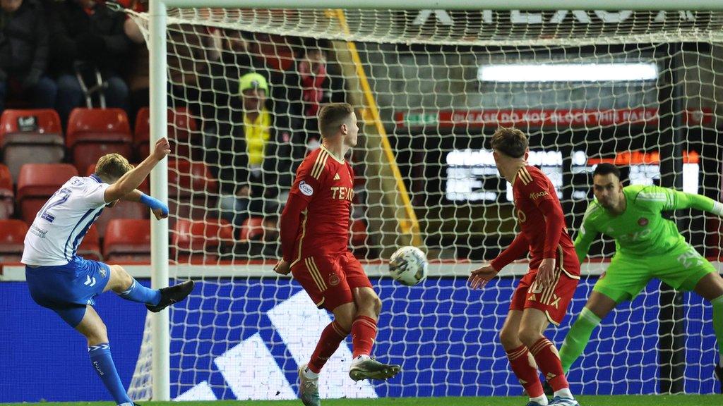 Kilmarnock's first away win of the Premiership season has intensified the pressure on Aberdeen boss Barry Robson