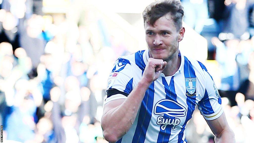 Michael Smith celebrates his opener against Rotherham