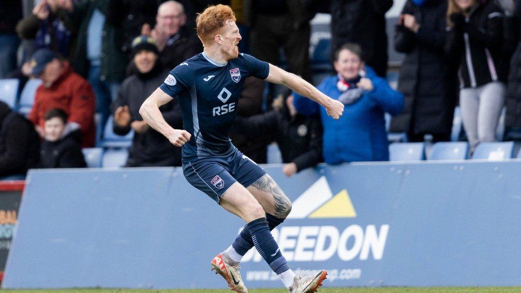 Simon Murray celebrates