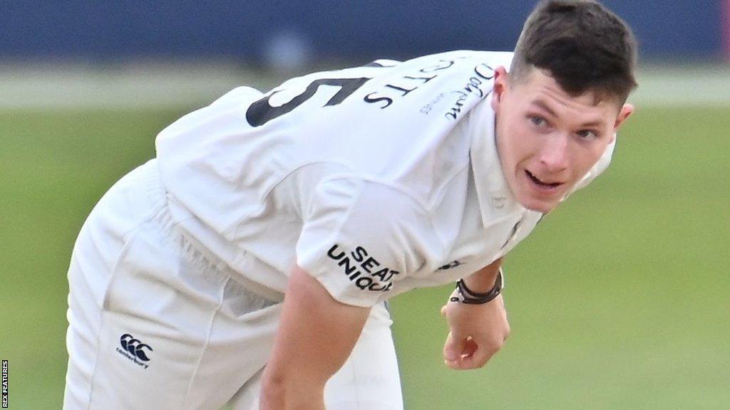 Matthew Potts bowls for Durham