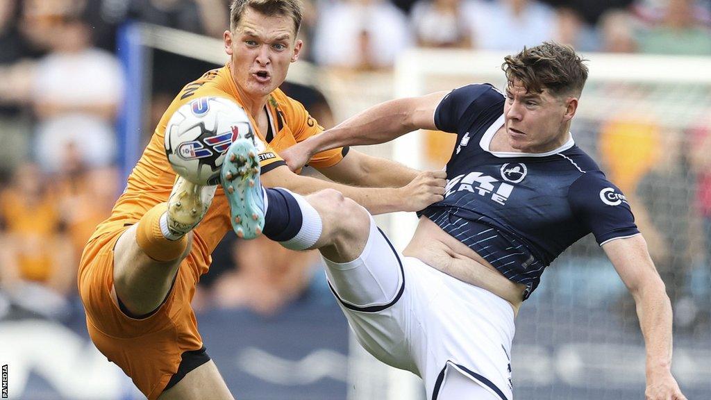 Millwall's Kevin Nisbet (right) in action against Hull City